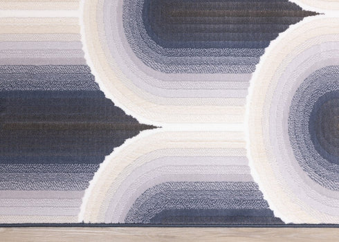 5' X 8' Cream And Blue Geometric Area Rug