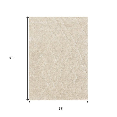 5' X 8' Cream And Beige Geometric Area Rug
