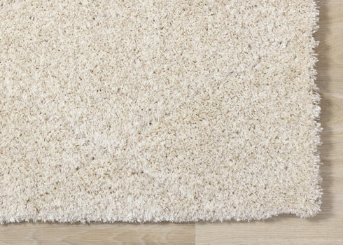 5' X 8' Cream And Beige Geometric Area Rug