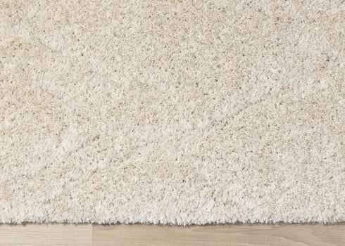 5' X 8' Cream And Beige Geometric Area Rug
