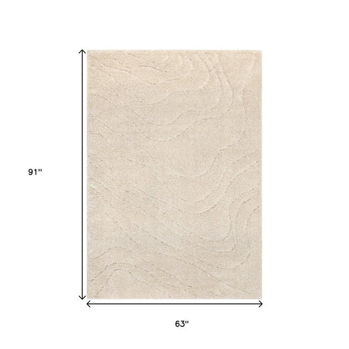 5' X 8' Cream And Beige Abstract Area Rug