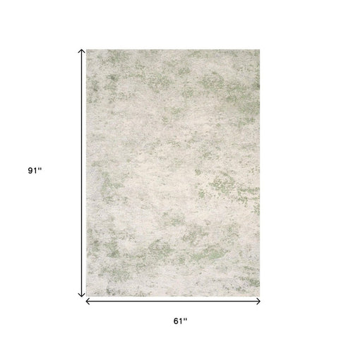 5' X 8' Cream And Green Abstract Area Rug
