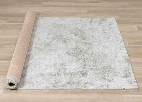 5' X 8' Cream And Green Abstract Area Rug