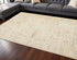 8' X 11' Cream And Beige Abstract Area Rug