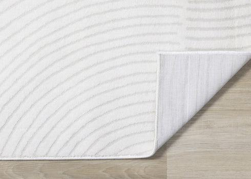5' X 8' Cream And Beige Geometric Area Rug