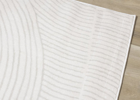 5' X 8' Cream And Beige Geometric Area Rug