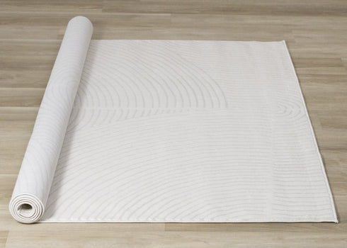 5' X 8' Cream And Beige Geometric Area Rug