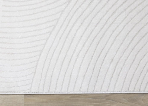 5' X 8' Cream And Beige Geometric Area Rug