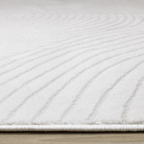 5' X 8' Cream And Beige Geometric Area Rug