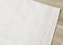5' X 8' Cream And White Geometric Area Rug