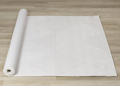 5' X 8' Cream And White Geometric Area Rug