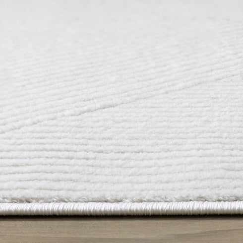 5' X 8' Cream And White Geometric Area Rug