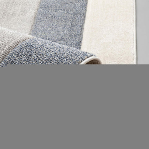 8' X 11' Blue Cream And Brown Geometric Area Rug