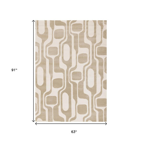 5' X 8' Cream And Beige Geometric Area Rug