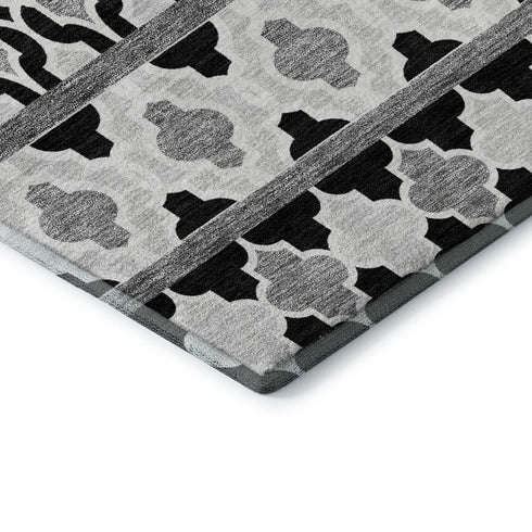 5' X 8' Black And Ivory Ikat Washable Area Rug With UV Protection