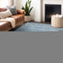 9' X 12' Sky Blue Gray And Ivory Ikat Washable Area Rug With UV Protection