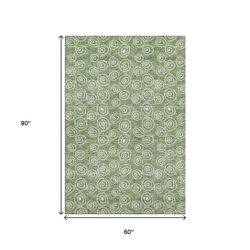 5' X 8' Green And Ivory Polka Dot Washable Area Rug With UV Protection