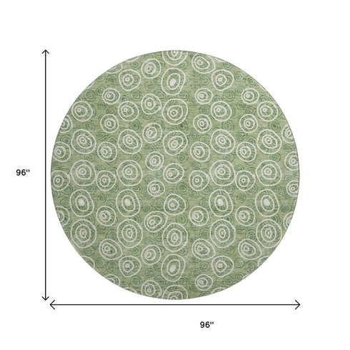8' Green And Ivory Polka Dot Washable Round Rug With UV Protection