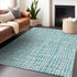 5' X 8' Teal And Ivory Striped Washable Area Rug With UV Protection