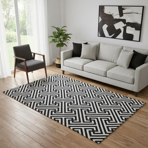 5' X 8' Black And Ivory Geometric Washable Area Rug With UV Protection