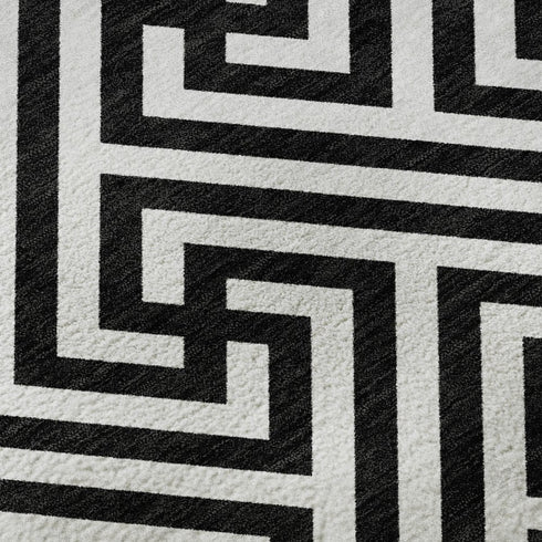 5' X 8' Black And Ivory Geometric Washable Area Rug With UV Protection