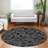 8' Black And Ivory Geometric Washable Round Rug With UV Protection