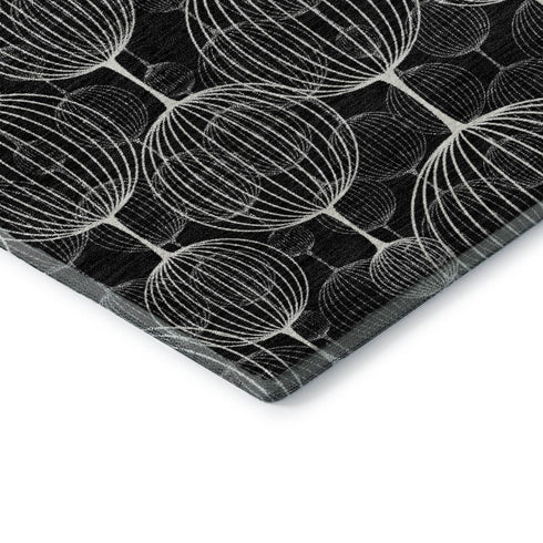 8' Black And Ivory Geometric Washable Round Rug With UV Protection