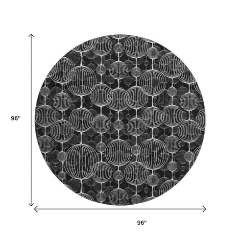 8' Black And Ivory Geometric Washable Round Rug With UV Protection
