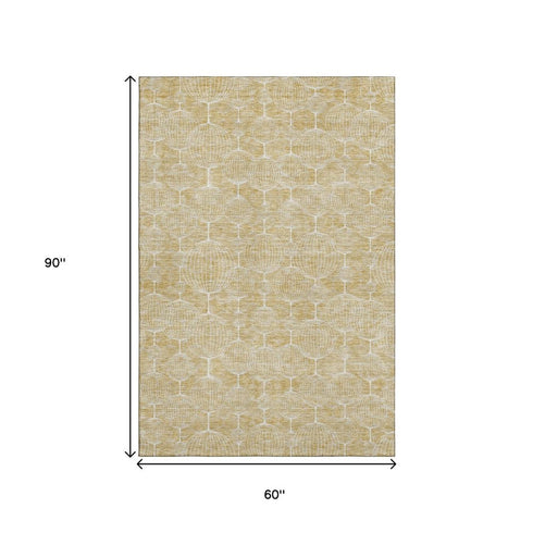5' X 8' Gold And Ivory Geometric Washable Area Rug With UV Protection