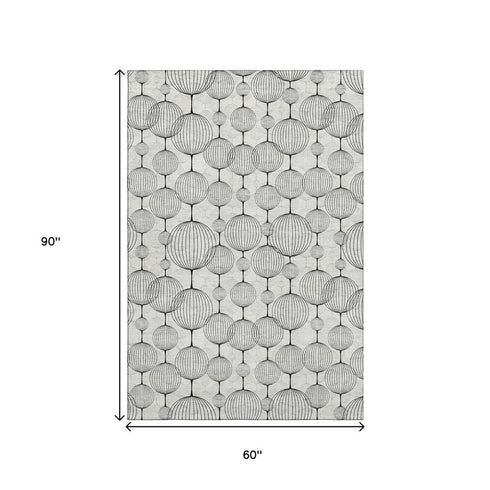5' X 8' Graphite And Silver Geometric Washable Area Rug With UV Protection