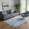 5' X 8' Blue And Ivory Abstract Washable Area Rug With UV Protection