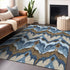 9' X 12' Blue Brown And Beige Ikat Washable Area Rug With UV Protection