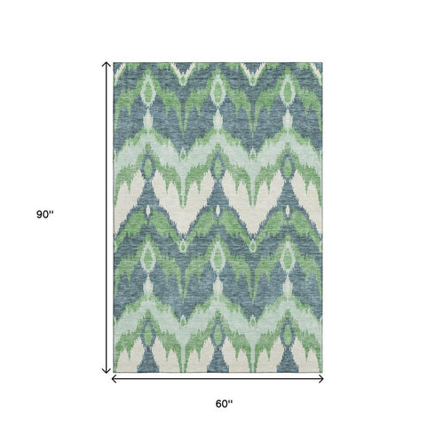 5' X 8' Green And Ivory Ikat Washable Area Rug With UV Protection