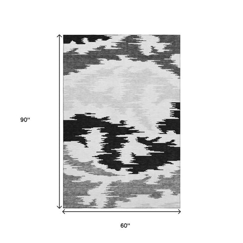 5' X 8' Black Gray And Silver Abstract Washable Area Rug With UV Protection