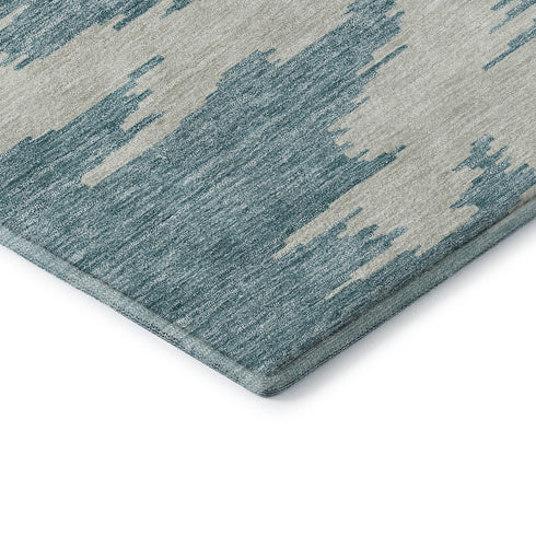 5' X 8' Teal And Ivory Abstract Washable Area Rug With UV Protection