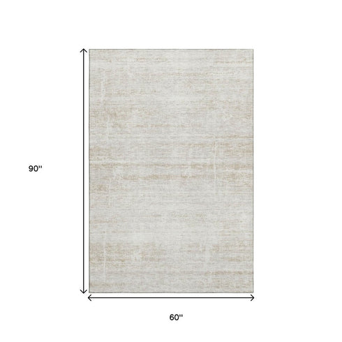 5' X 8' Ivory And Beige Abstract Washable Area Rug With UV Protection