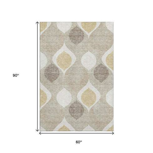 5' X 8' Beige Ivory And Gold Ogee Washable Area Rug With UV Protection