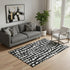 5' X 8' Black And Ivory Cobblestone Washable Area Rug With UV Protection