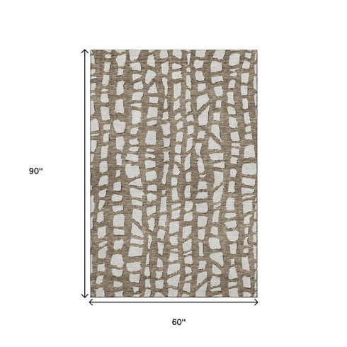 5' X 8' Brown And Ivory Cobblestone Washable Area Rug With UV Protection