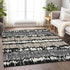 9' X 12' Black Silver And Brown Striped Washable Area Rug With UV Protection