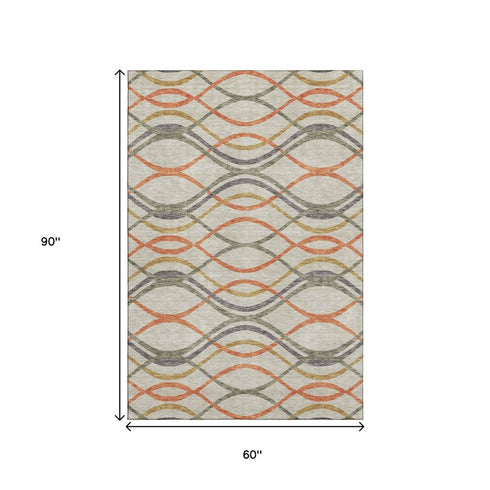 5' X 8' Orange Ivory And Gold Abstract Washable Area Rug With UV Protection