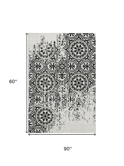 5' X 8' Black And Ivory Medallion Washable Area Rug With UV Protection