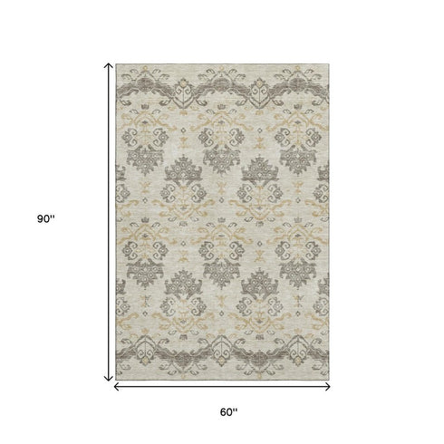 5' X 8' Beige Gold And Taupe Medallion Washable Area Rug With UV Protection