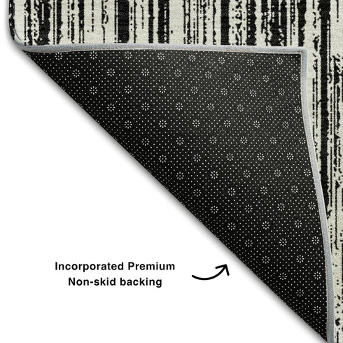 8' Black And Ivory Striped Washable Round Rug With UV Protection