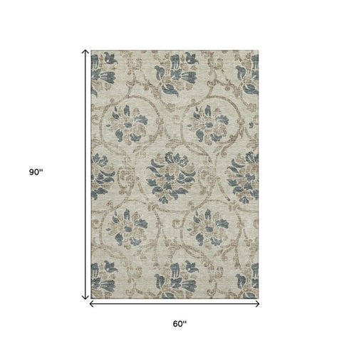5' X 8' Beige Blue And Tan Floral Washable Area Rug With UV Protection
