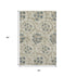5' X 8' Beige Blue And Tan Floral Washable Area Rug With UV Protection