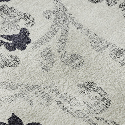5' X 8' Black And Ivory Floral Washable Area Rug With UV Protection