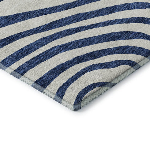 5' X 8' Blue And Ivory Abstract Washable Area Rug With UV Protection