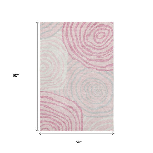 5' X 8' Pink Gray And Ivory Abstract Washable Area Rug With UV Protection