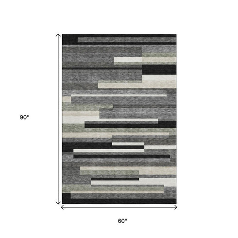 5' X 8' Black Gray And Ivory Striped Washable Area Rug With UV Protection